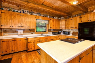 Step into timeless mountain living with this 3-bedroom, 3-bath