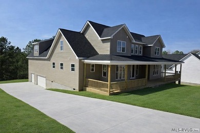 Spectacular NEW CONSTRUCTION, Lake Gaston home features the - photo 1