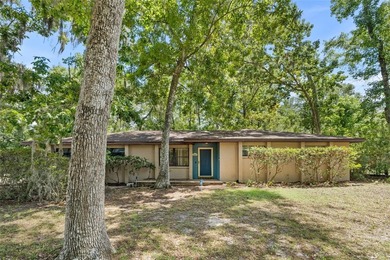 Welcome to your new home! Nestled on a spacious half-acre lot in - photo 1