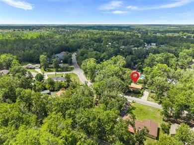 Welcome to your new home! Nestled on a spacious half-acre lot in - photo 2