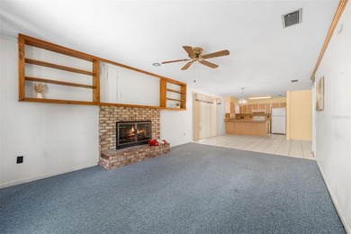 Welcome to your new home! Nestled on a spacious half-acre lot in - photo 4