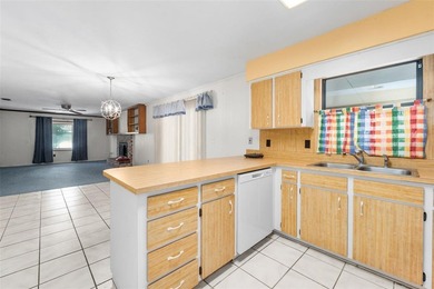Welcome to your new home! Nestled on a spacious half-acre lot in - photo 10