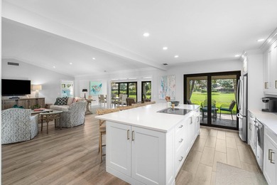 Enjoy tranquil golf and lake views from this beautifully - photo 9