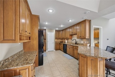 This 5-bedroom, 3.5-bath lakefront home in Four Seasons is - photo 19