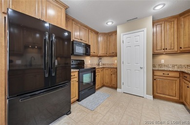 This 5-bedroom, 3.5-bath lakefront home in Four Seasons is - photo 21