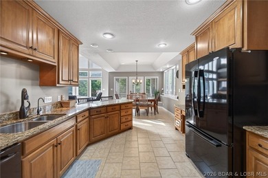 This 5-bedroom, 3.5-bath lakefront home in Four Seasons is - photo 23