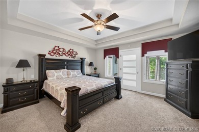 This 5-bedroom, 3.5-bath lakefront home in Four Seasons is - photo 25