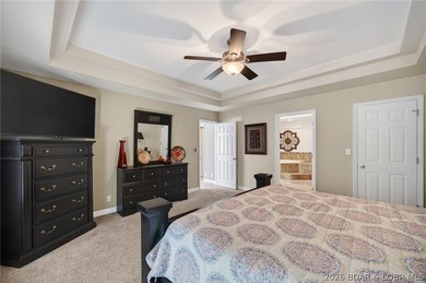 This 5-bedroom, 3.5-bath lakefront home in Four Seasons is - photo 27