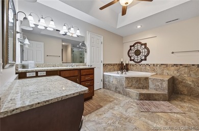 This 5-bedroom, 3.5-bath lakefront home in Four Seasons is - photo 28