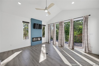 This 5-bedroom, 3.5-bath lakefront home in Four Seasons is - photo 34