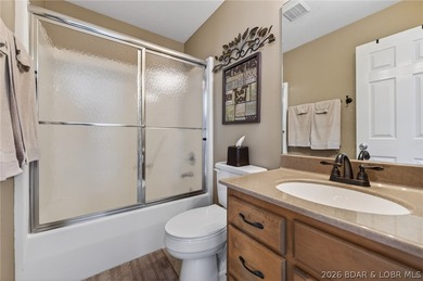 This 5-bedroom, 3.5-bath lakefront home in Four Seasons is - photo 42
