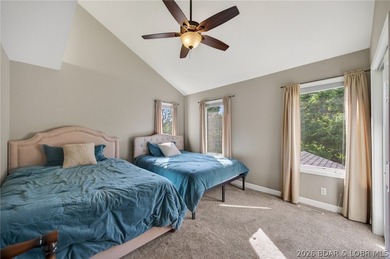 This 5-bedroom, 3.5-bath lakefront home in Four Seasons is - photo 47