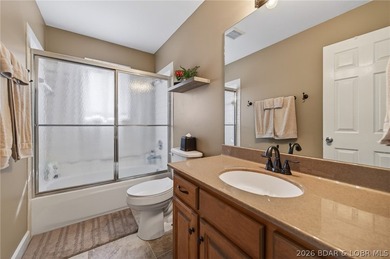 This 5-bedroom, 3.5-bath lakefront home in Four Seasons is - photo 49