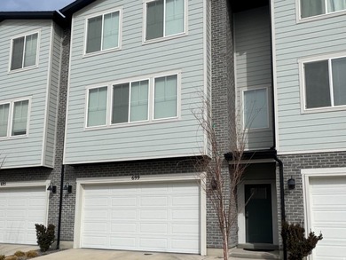 This stunning 3 bedroom, 3 bathroom townhome offers a perfect - photo 2