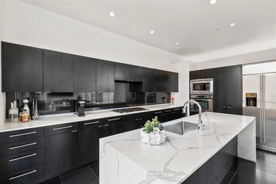 Welcome to Art House Unit 3C, a top-floor, luxury condo designed