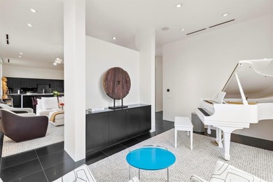 Welcome to Art House Unit 3C, a top-floor, luxury condo designed