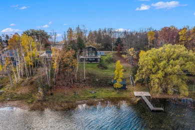 Hackert Lake Home For Sale in Scottville Michigan