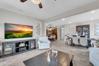 Step into a true open-concept layout where the kitchen, dining