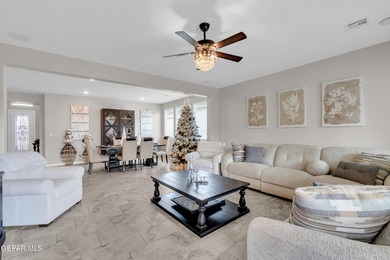 Step into a true open-concept layout where the kitchen, dining