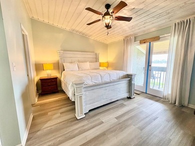 Wake up to peaceful lake views in this Beautifully Maintained - photo 14