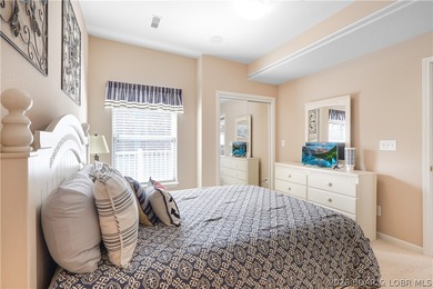 This well-positioned 5th-floor end-unit condo offers expansive