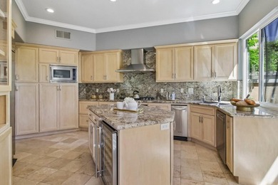 Rarely available, this townhouse-style condo is inside the - photo 17