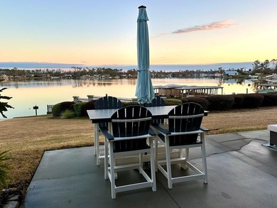 Wake up to peaceful lake views in this Beautifully Maintained - photo 20