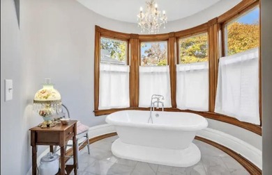 Step into a piece of Racine history with this stunning Queen - photo 21