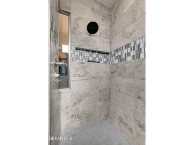 Step into a true open-concept layout where the kitchen, dining