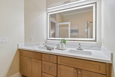Rarely available, this townhouse-style condo is inside the - photo 30
