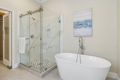 Rarely available, this townhouse-style condo is inside the - photo 31