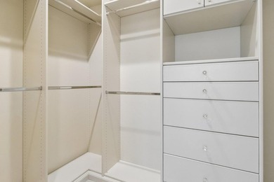 Rarely available, this townhouse-style condo is inside the - photo 32