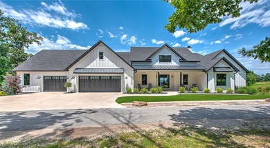 Experience lakefront living in this 2024 custom Beaver Lake - photo 1