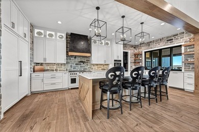 Experience lakefront living in this 2024 custom Beaver Lake - photo 10