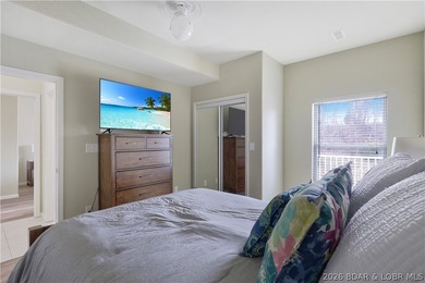 Welcome to Monarch Cove, where this fully furnished, top-floor - photo 12