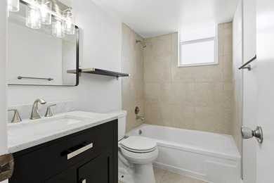 Fully renovated 2BR, 2 bath Condo. New laminate floors, kitchen - photo 12