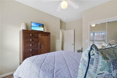 Welcome to Monarch Cove, where this fully furnished, top-floor - photo 17