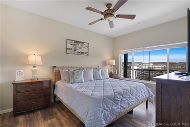 Welcome to Monarch Cove, where this fully furnished, top-floor - photo 18