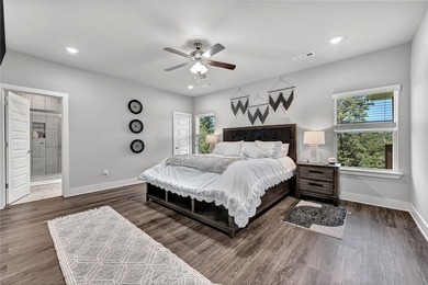 Tucked into the wooded hills of Bella Vista, this home delivers - photo 7