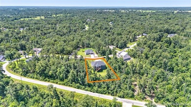 Tucked into the wooded hills of Bella Vista, this home delivers - photo 8