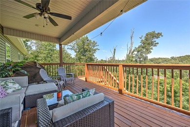 Tucked into the wooded hills of Bella Vista, this home delivers - photo 9