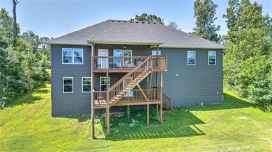 Tucked into the wooded hills of Bella Vista, this home delivers - photo 10