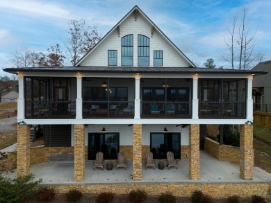 Classic A-frame with a wrap-around porch complete with a screen - Lake Home For Sale in Bremen, Alabama