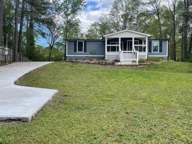 Lake Home For Sale in Acworth, Georgia