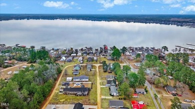 Discover lake living in this delightful, 4 bedroom, 2 bathroom - photo 2