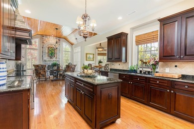 This exquisite, move-in-ready estate is perfectly situated on a - photo 24