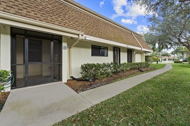 Welcome to this charming corner unit three-bedroom, two-bathroom - photo 7