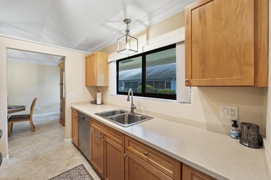 Welcome to this charming corner unit three-bedroom, two-bathroom - photo 8