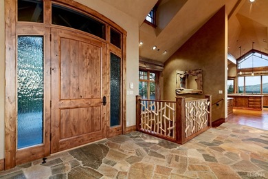 Beyond a stately iron gate and down a winding drive framed by - photo 6