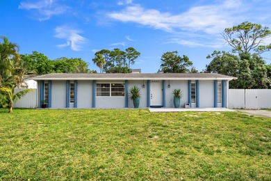 Welcome to this well-maintained 4-bedroom, 2-bathroom home - photo 1